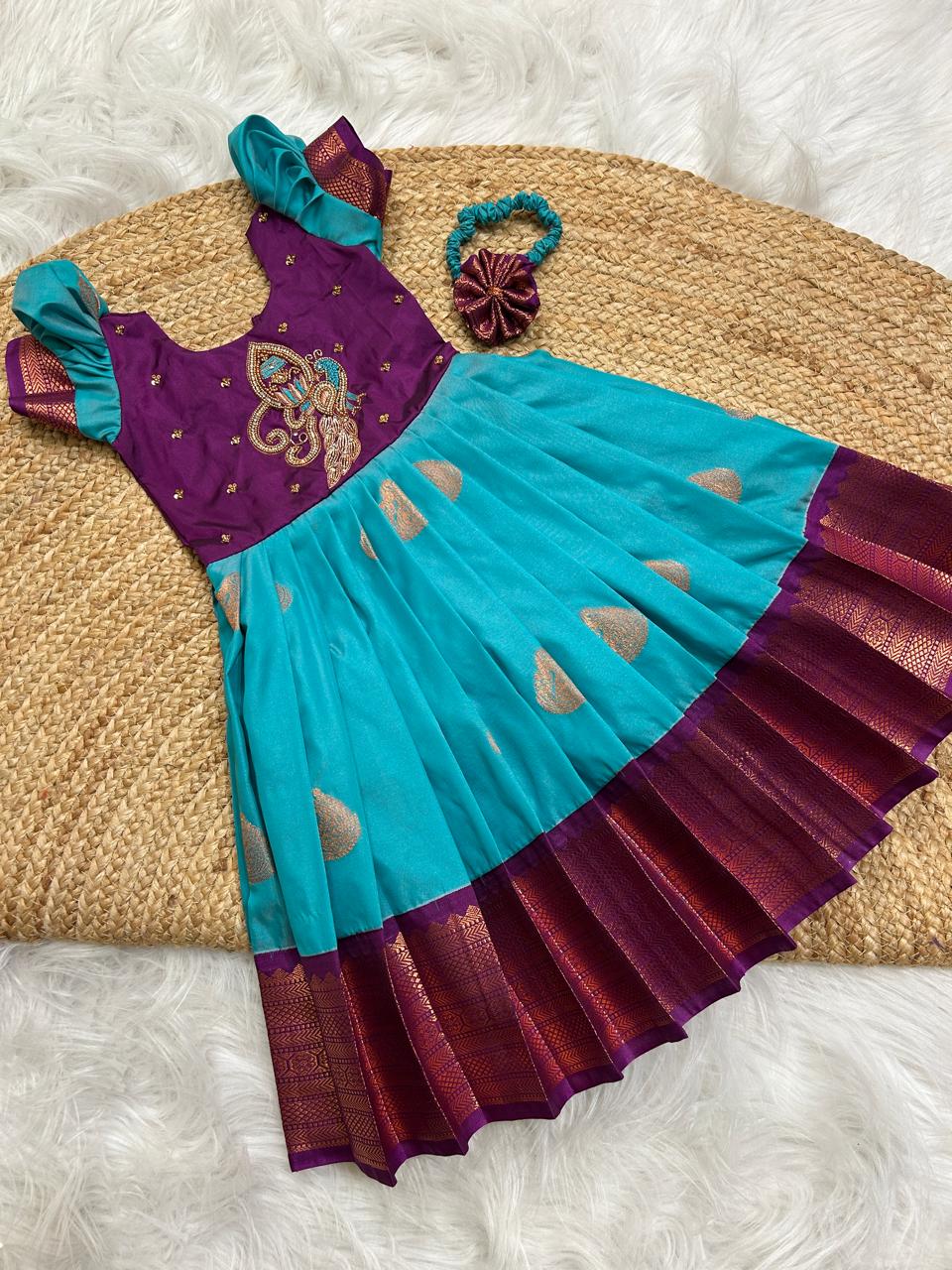 (SB372)Ramya Pandian Inspired Saree as Silk Gown with Vel and Peacock Aari Work