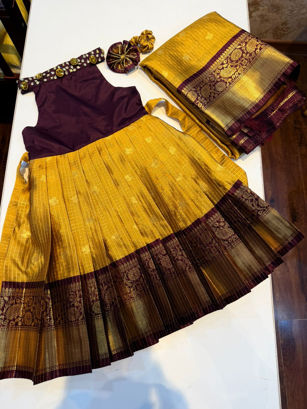 (SB535)Yellow with Brown Gadwal Silk Gown with Choker Neck Pattern Highlighted with Rhinestones